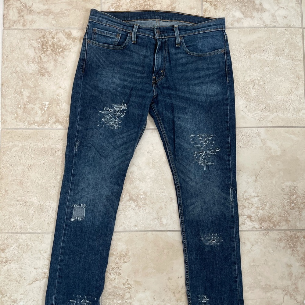 Levi’s 511 distressed jeans
